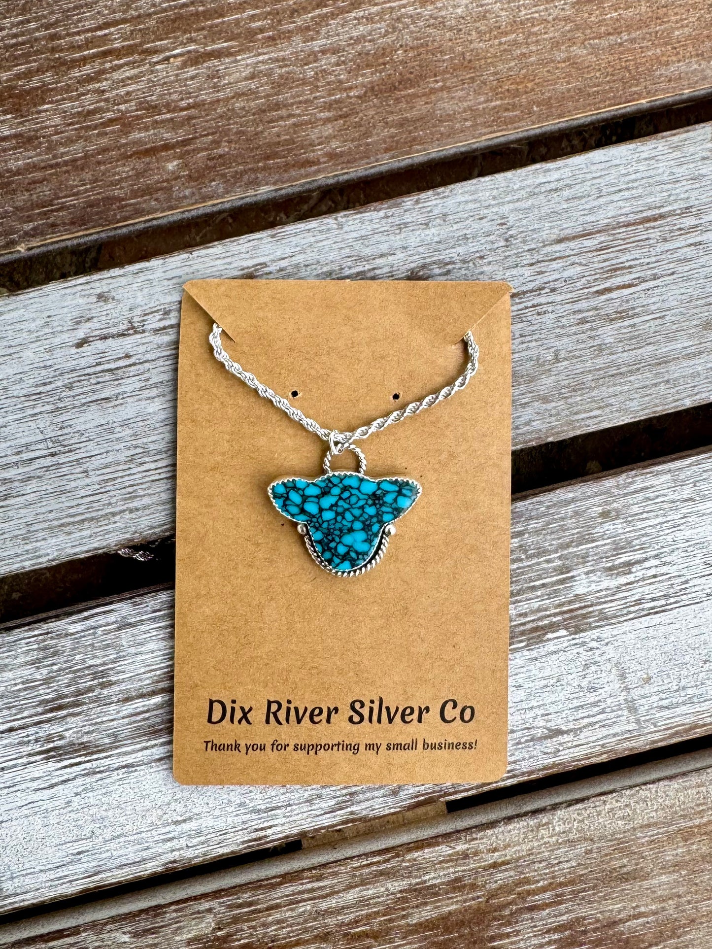 Gibbisite Turquoise Cow Head Necklace 16"