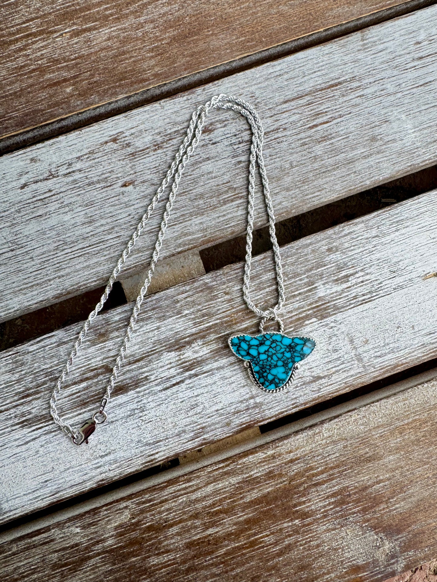 Gibbisite Turquoise Cow Head Necklace 16"